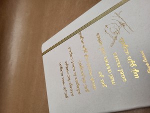 Notitieblok gouden tekst
