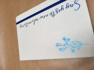 Notitieblok blauwe tekst
